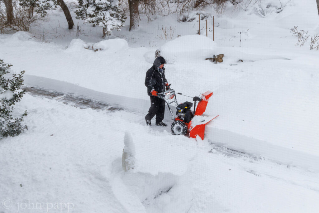 Ariens Deluxe 28 cuts a wide path through driveway