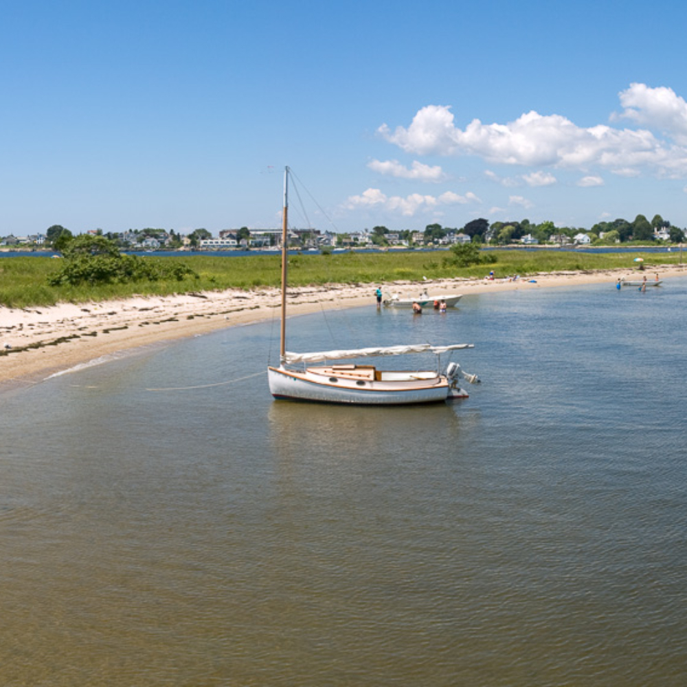 Sandy Point Panorama with Marshal Catboat and Seagulls people on beach