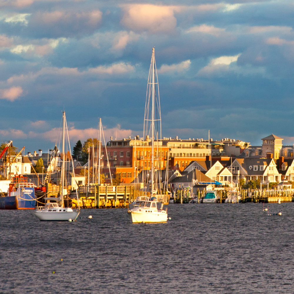 Long shot of Stonington Borough from town dock to point at sunset